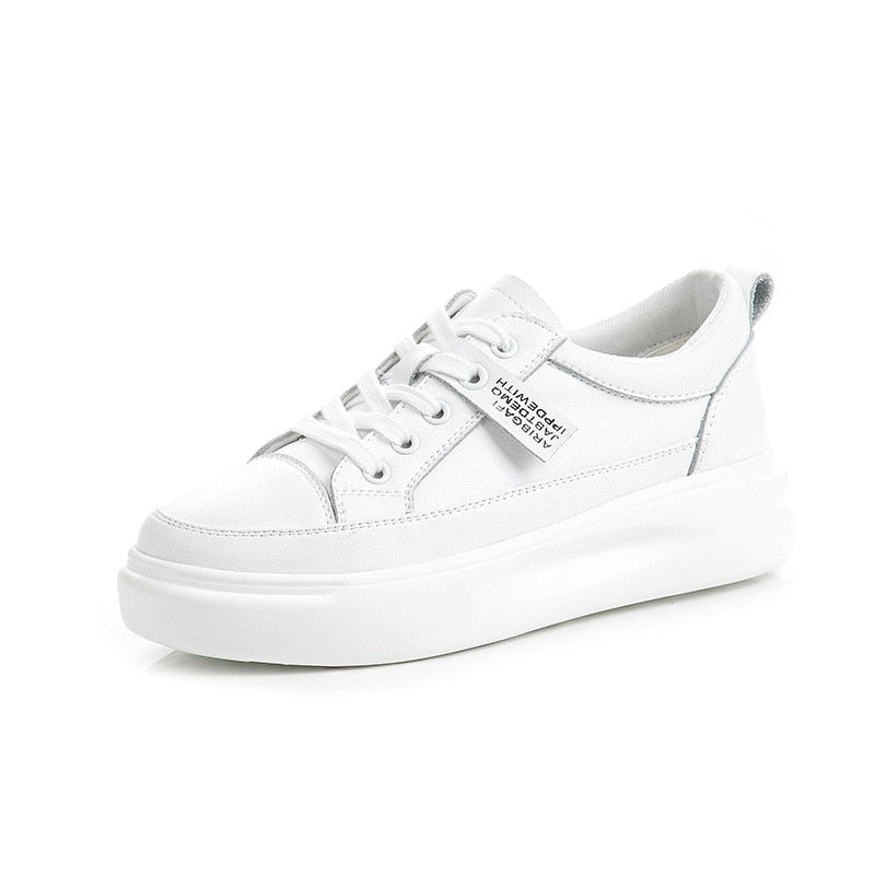 Stora vita damsneakers